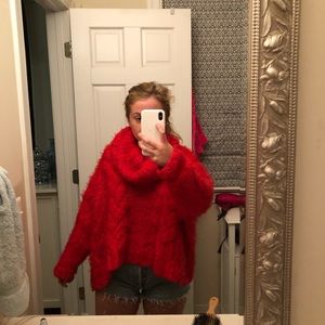 Oversized red cable sweater